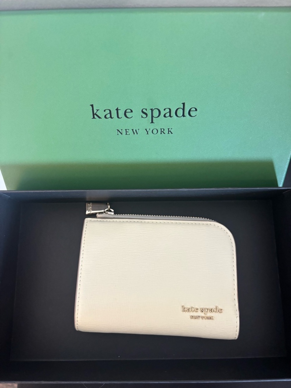 Kate Spade cream zip card wallet